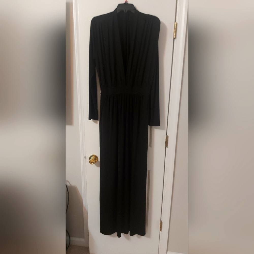 Floor length black Fashion Nova Dress with thigh high slits.